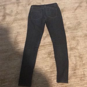 Blue dark watch jeans.